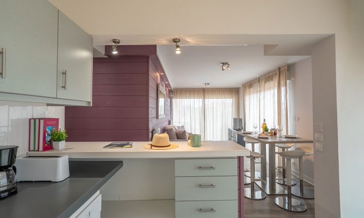 T3 prestige avec coin déjeuner pratique et ambiance premium. Coin repas moderne d’un appartement T3 prestige avec belle luminosité.