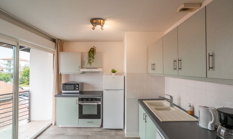 T3 prestige avec cuisine spacieuse, électroménager intégré et ambiance premium.